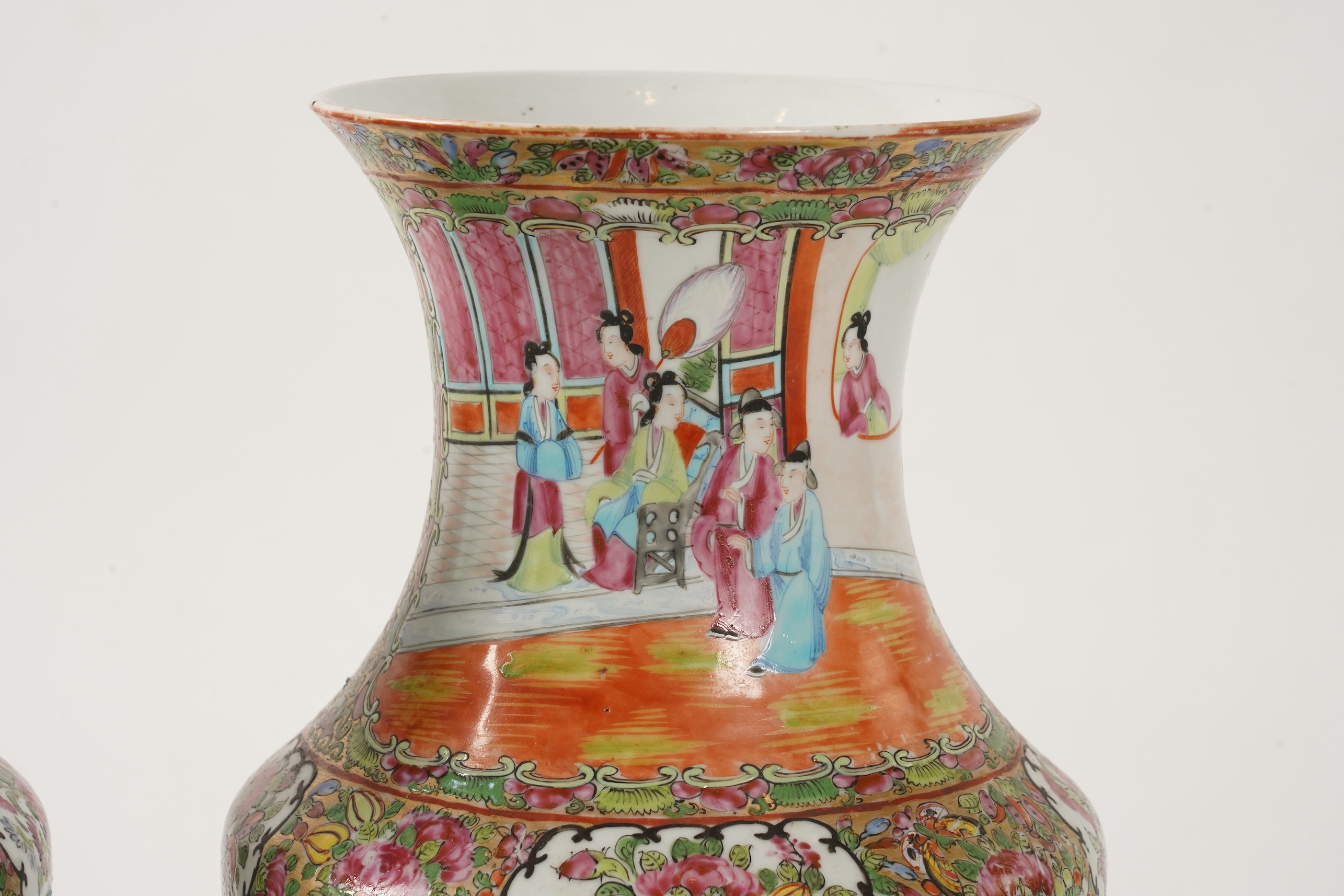 A pair of Chinese famille rose vases, 19th century
